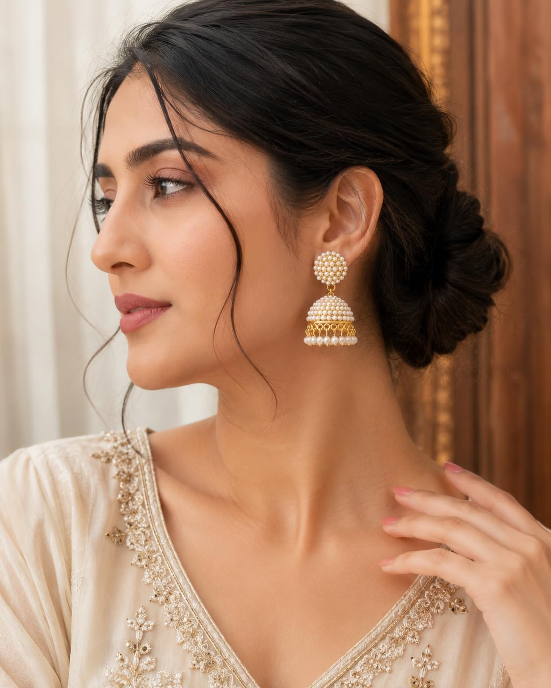 Aishri Gold Plated Pearl Studded Jhumka Earrings